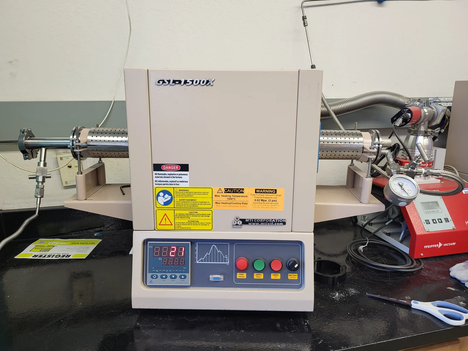 GSL-1500X tube furnace with sealed tube connections and vacuum equipment